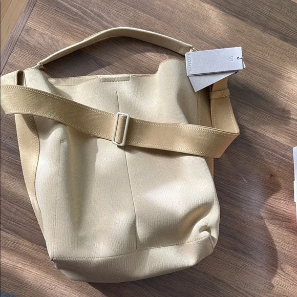 Rothy's Cream Bucket Bag with Slouchy Design - Picture 1 of 5